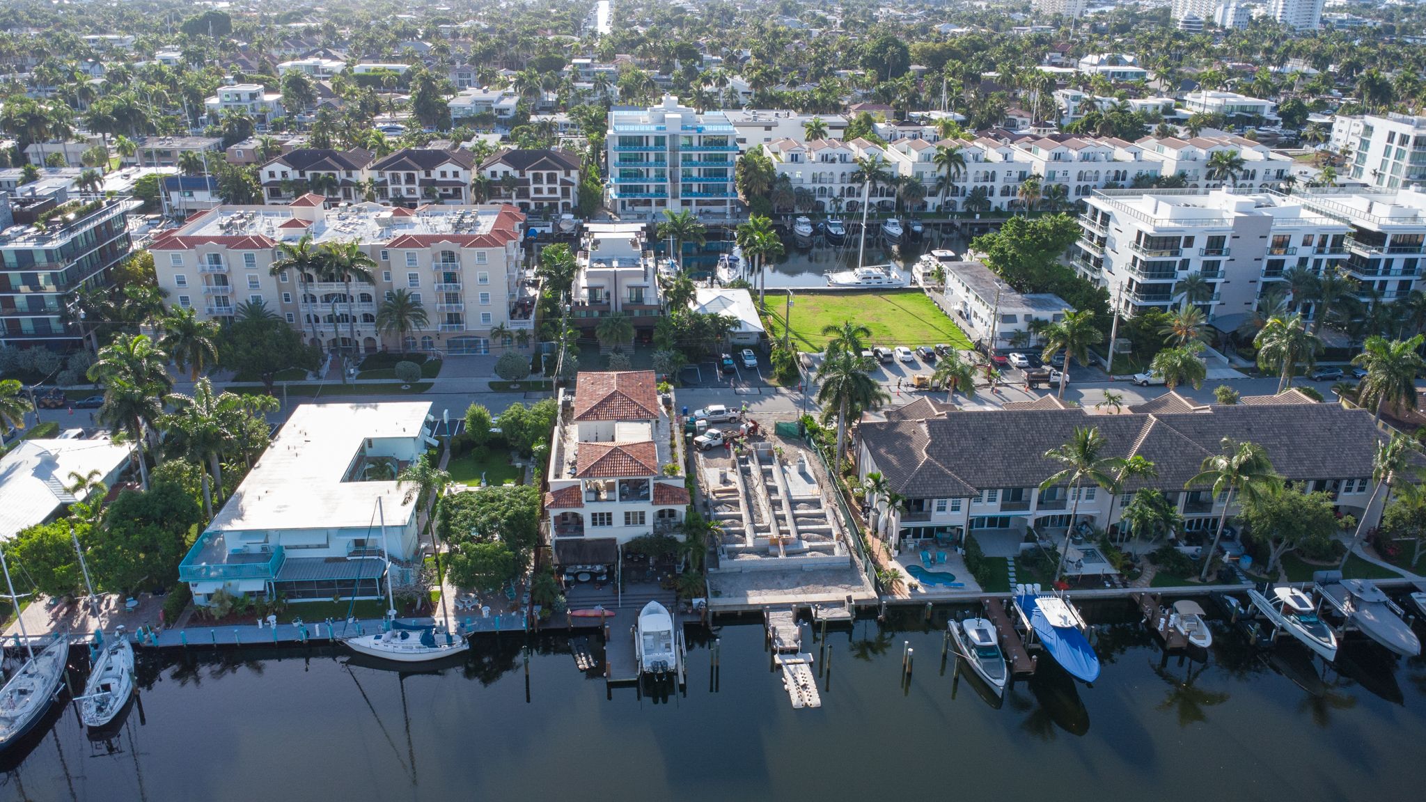 Boats docked along the seawalls of a Fort Lauderdale canal